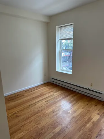 a view of an empty room and window