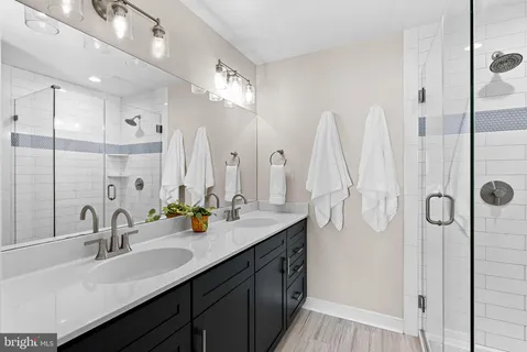 a room with chairs and wooden floor