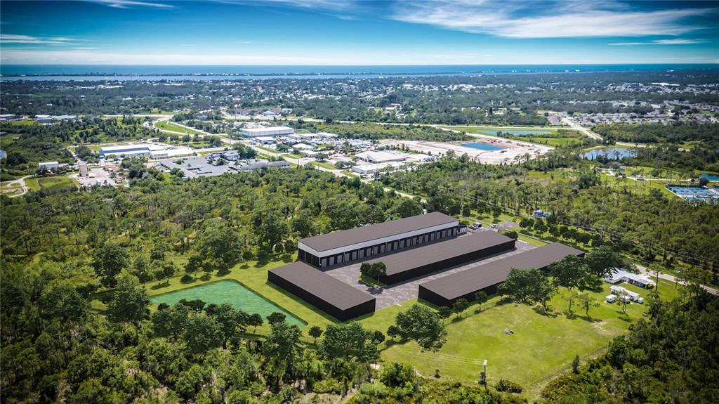1081 South River Road Englewood, FL 34223 - Photo 5 of 7 an aerial view of a house with a yard