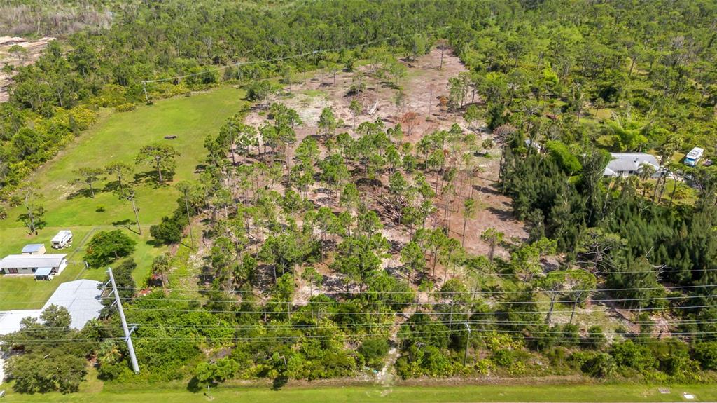 1081 South River Road Englewood, FL 34223 - Photo 6 of 7 a view of a yard