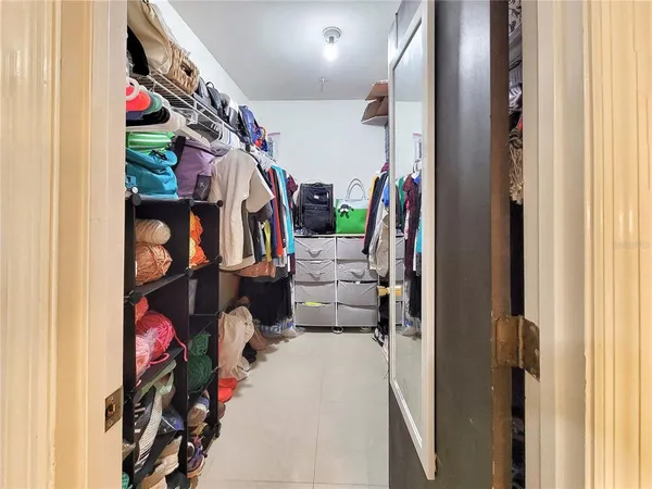 a view of a storage & utility room with washer and dryer