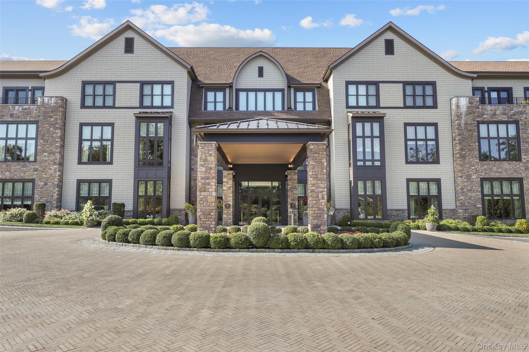 a front view of residential houses with street