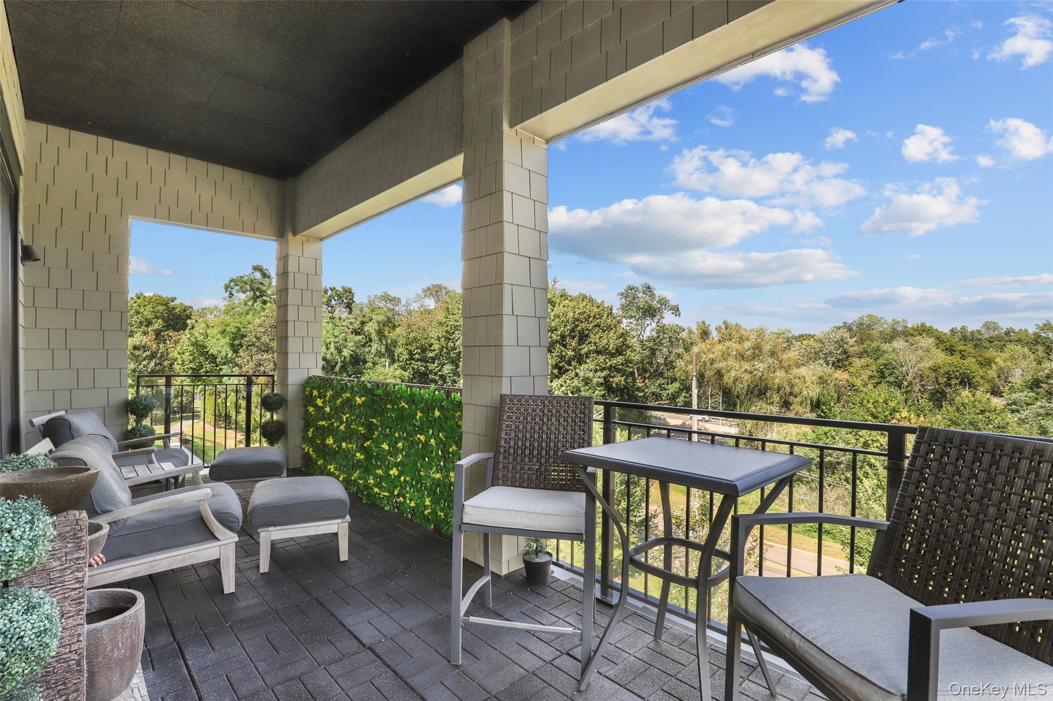 120 Old Post Road, Unit PHB301 Rye, NY 10580 - Photo 11 of 30 a view of a chairs and table in patio
