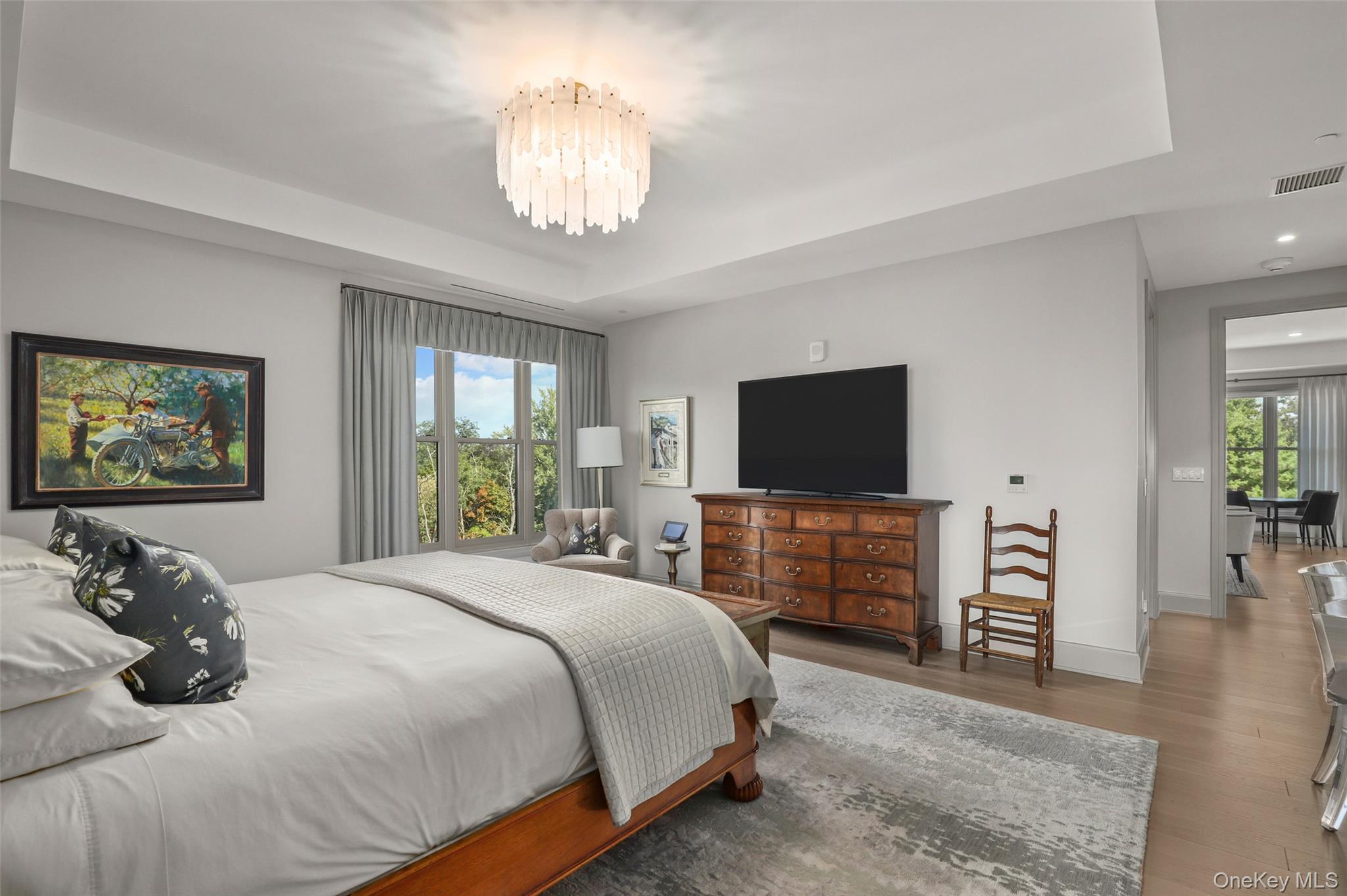 120 Old Post Road, Unit PHB301 Rye, NY 10580 - Photo 13 of 30 a bedroom with a bed and a flat screen tv