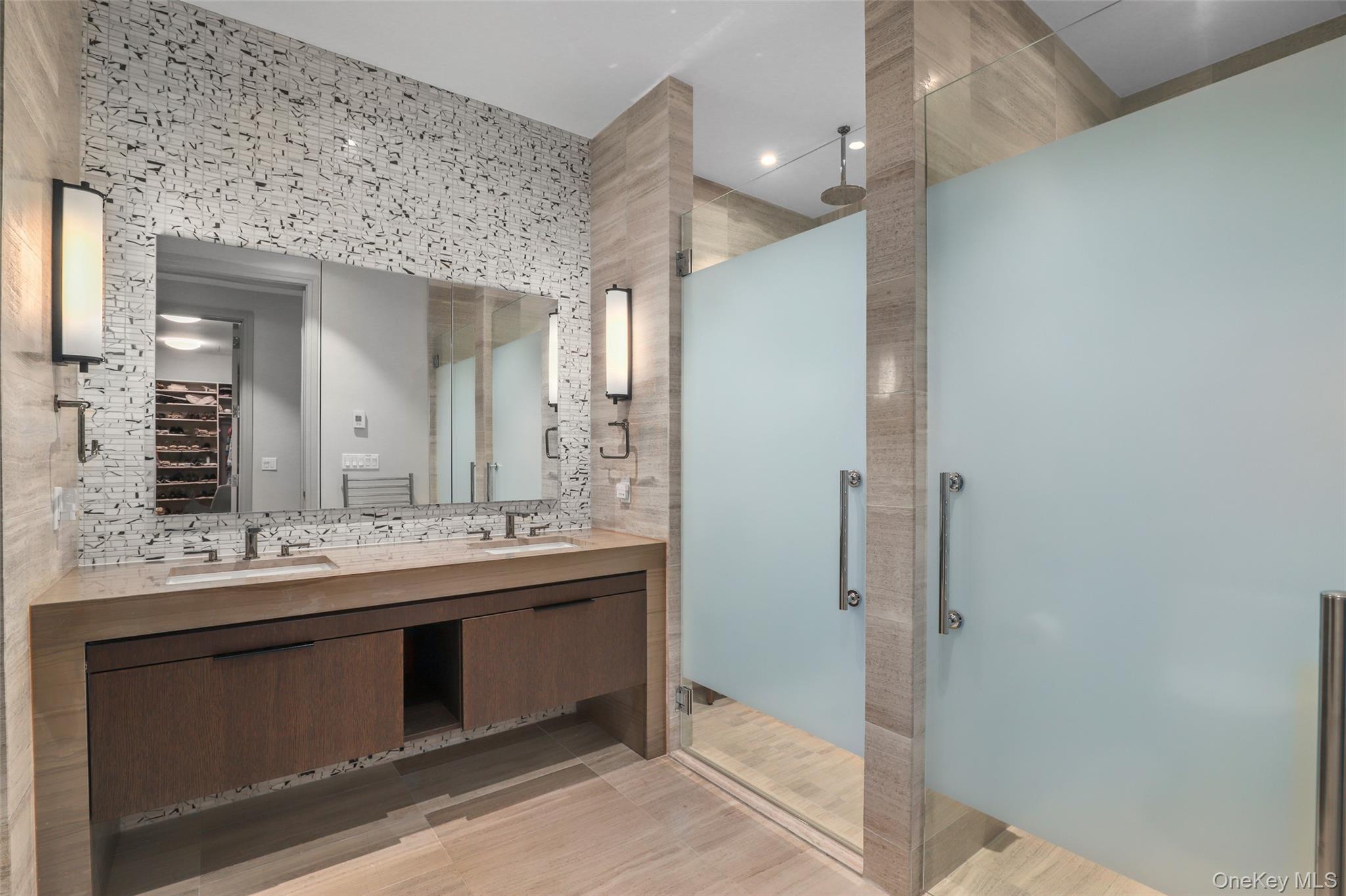 120 Old Post Road, Unit PHB301 Rye, NY 10580 - Photo 14 of 30 a bathroom with a double vanity sink mirror and double