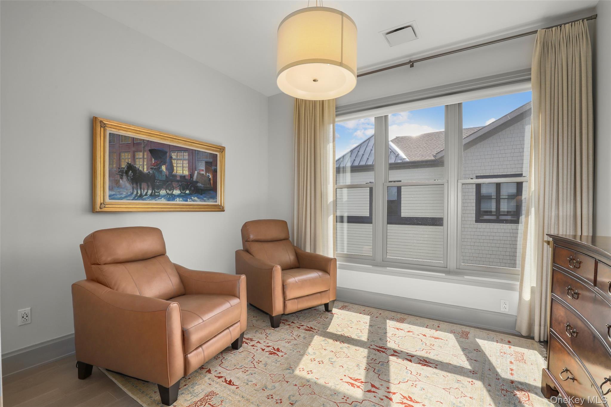 120 Old Post Road, Unit PHB301 Rye, NY 10580 - Photo 21 of 30 a living room with furniture and a window