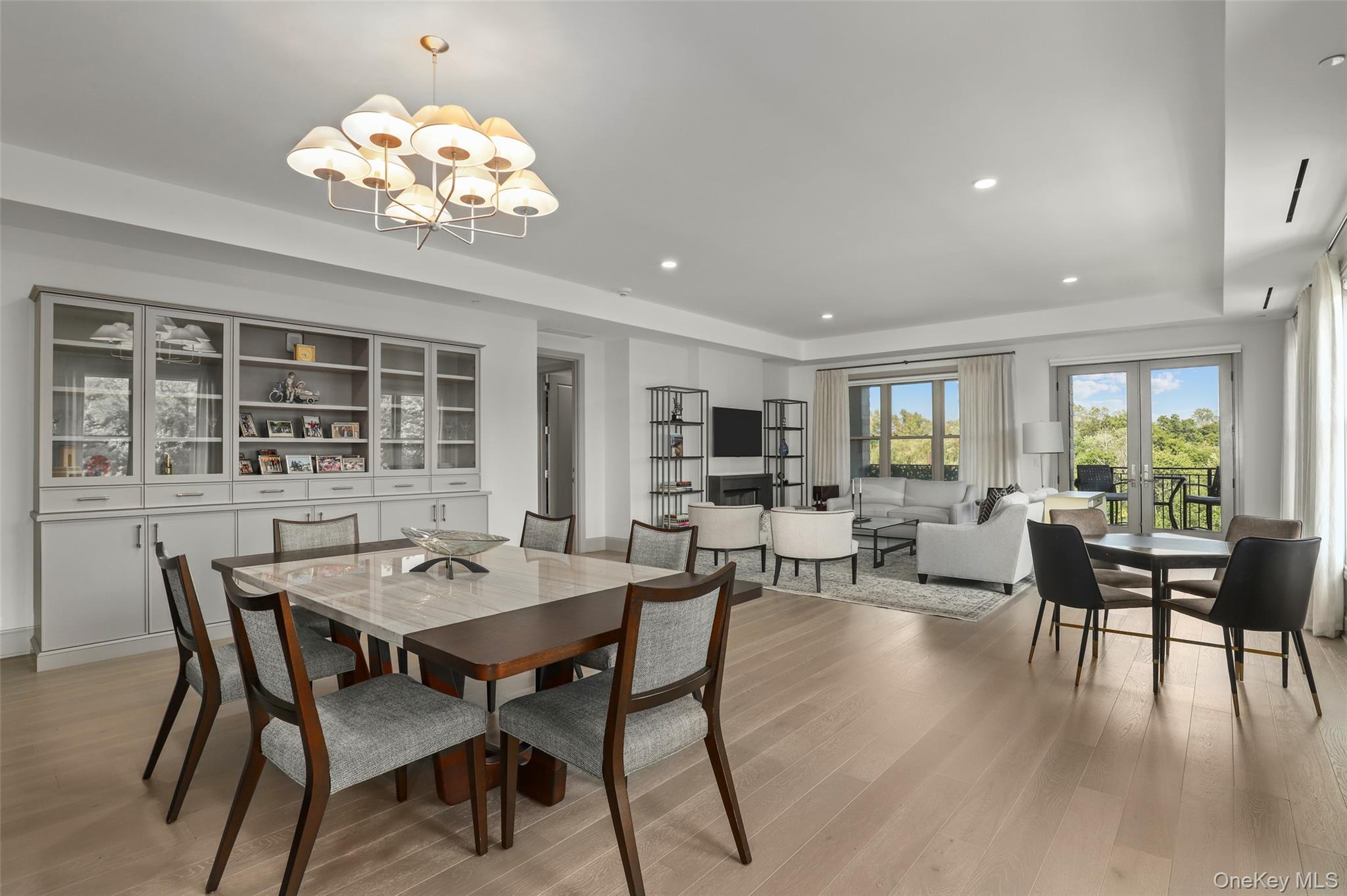 120 Old Post Road, Unit PHB301 Rye, NY 10580 - Photo 4 of 30 a view of a dining room with furniture window and outside view