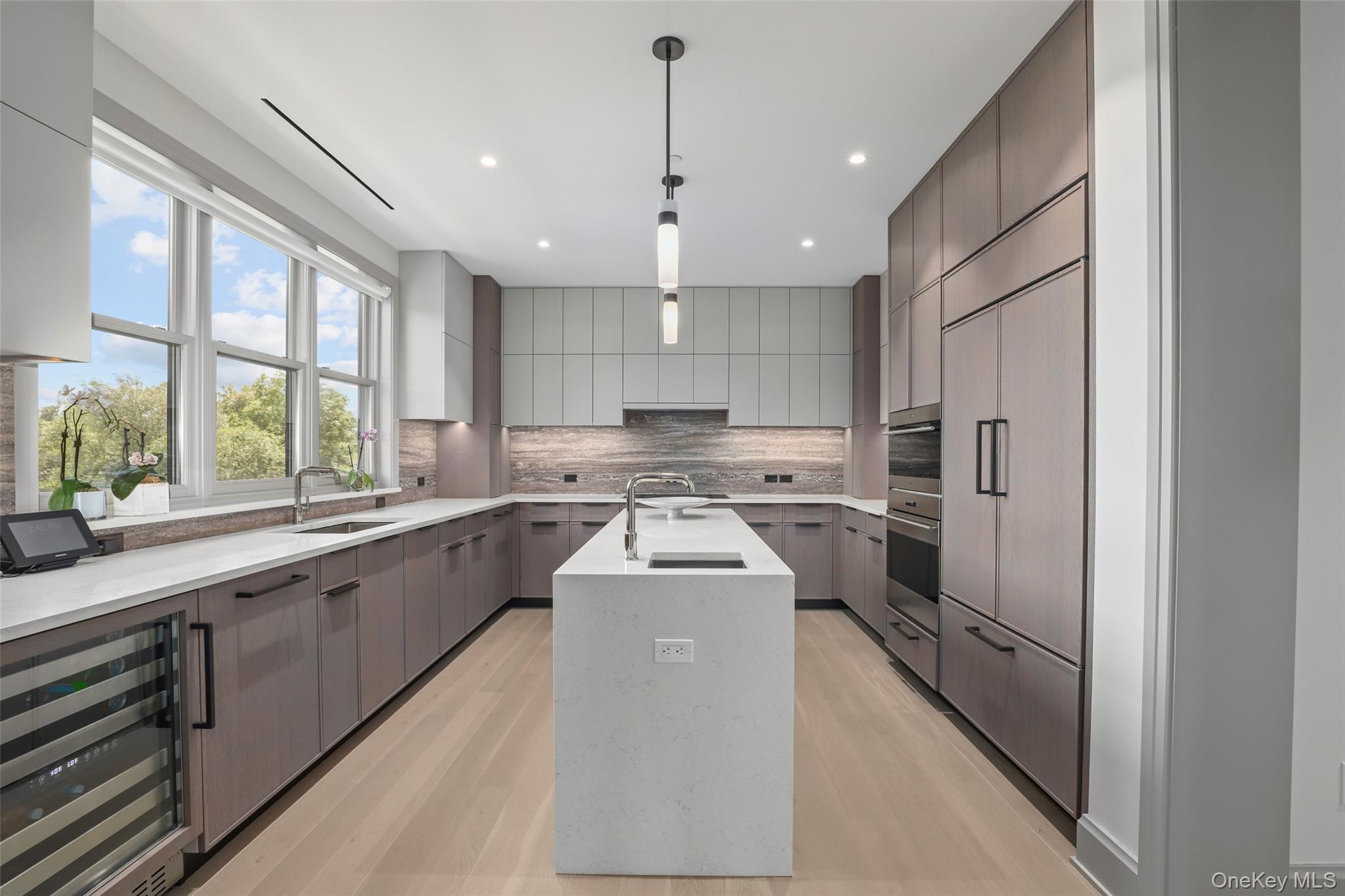 120 Old Post Road, Unit PHB301 Rye, NY 10580 - Photo 9 of 30 a kitchen with refrigerator a sink and a stove