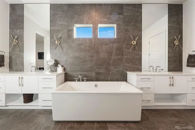a bathroom with sink and mirror