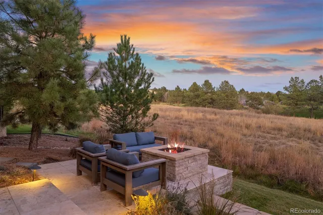 a view of a terrace with a lake view