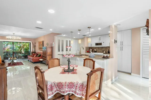 a view of a dining room with furniture