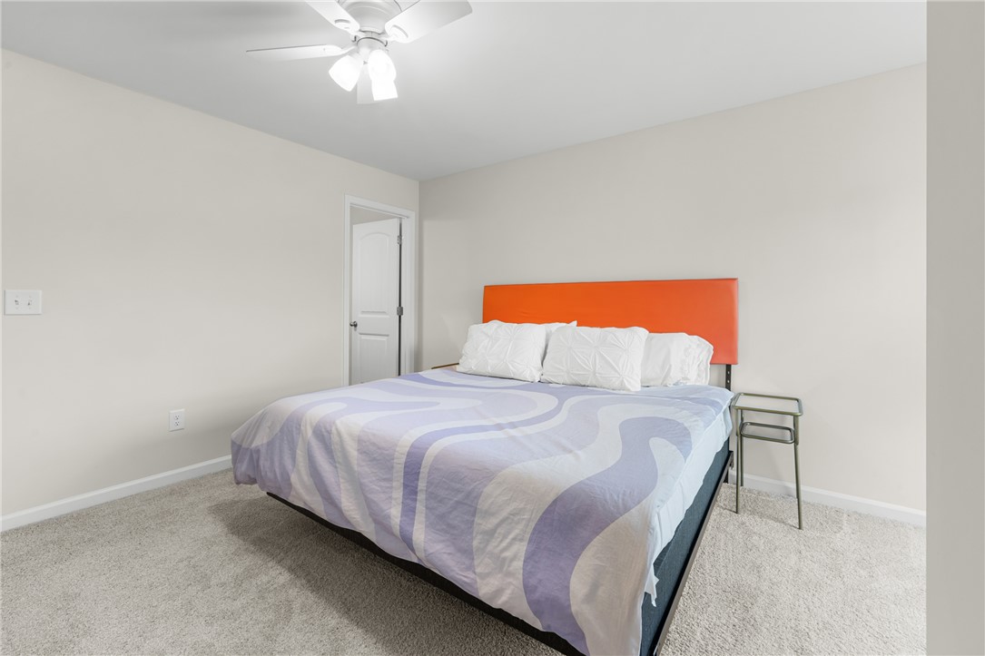 235 Pendleton Road, Unit Q1 Clemson, SC 29631 - Photo 24 of 30 This cozy bedroom offers a tranquil retreat for rest and rejuvenation.