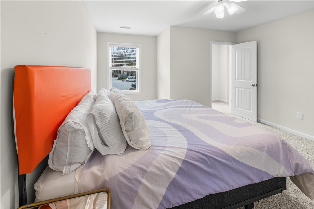 235 Pendleton Road, Unit Q1 Clemson, SC 29631 - Photo 25 of 30 This spacious bedroom offers ample natural light and a comfortable, inviting atmosphere.