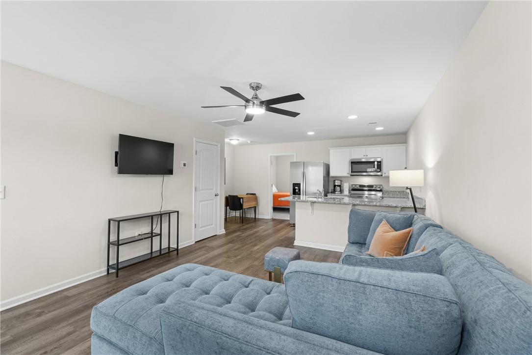 235 Pendleton Road, Unit Q1 Clemson, SC 29631 - Photo 4 of 30 This inviting space seamlessly connects living and kitchen areas, perfect for daily life and entertaining.