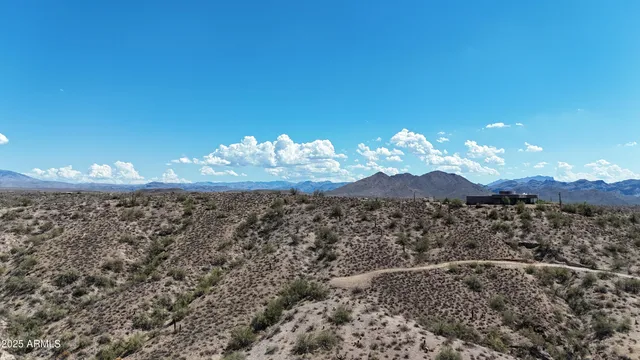 a view of a house with a mountain