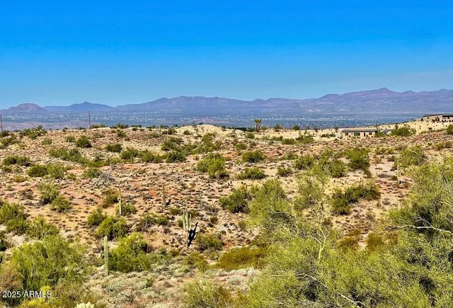 a view of a city with mountain
