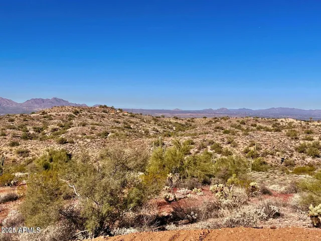 a view of a city with mountain