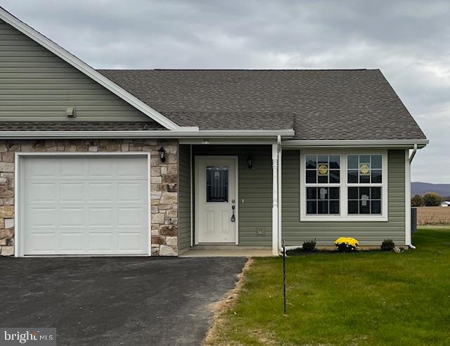 a house view with a garden space