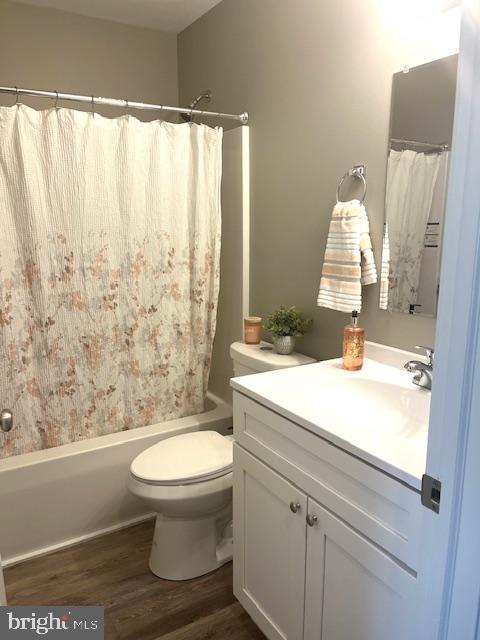 19 Pacific Avenue Milroy, PA 17063 - Photo 10 of 11 a bathroom with a granite countertop sink a toilet and a shower