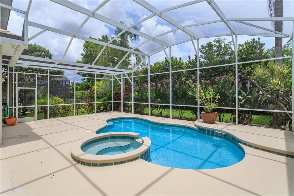 11445 Vicolo Loop Windermere, FL 34786 - Photo 2 of 28 a view of a white building with swimming pool in front of it