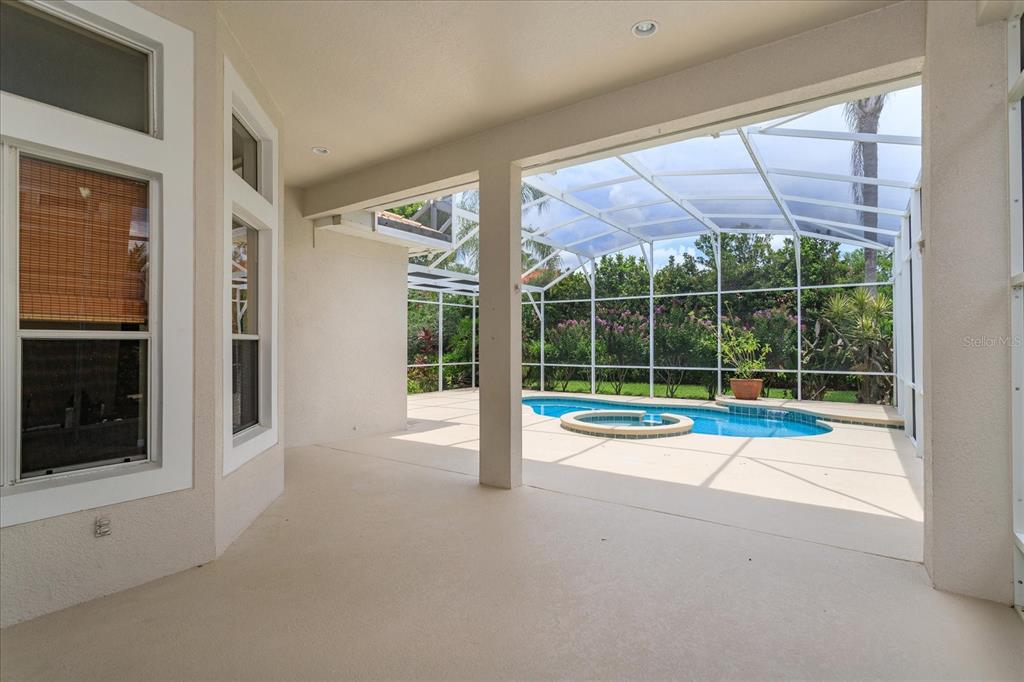 11445 Vicolo Loop Windermere, FL 34786 - Photo 28 of 28 a view of empty room with floor to ceiling window