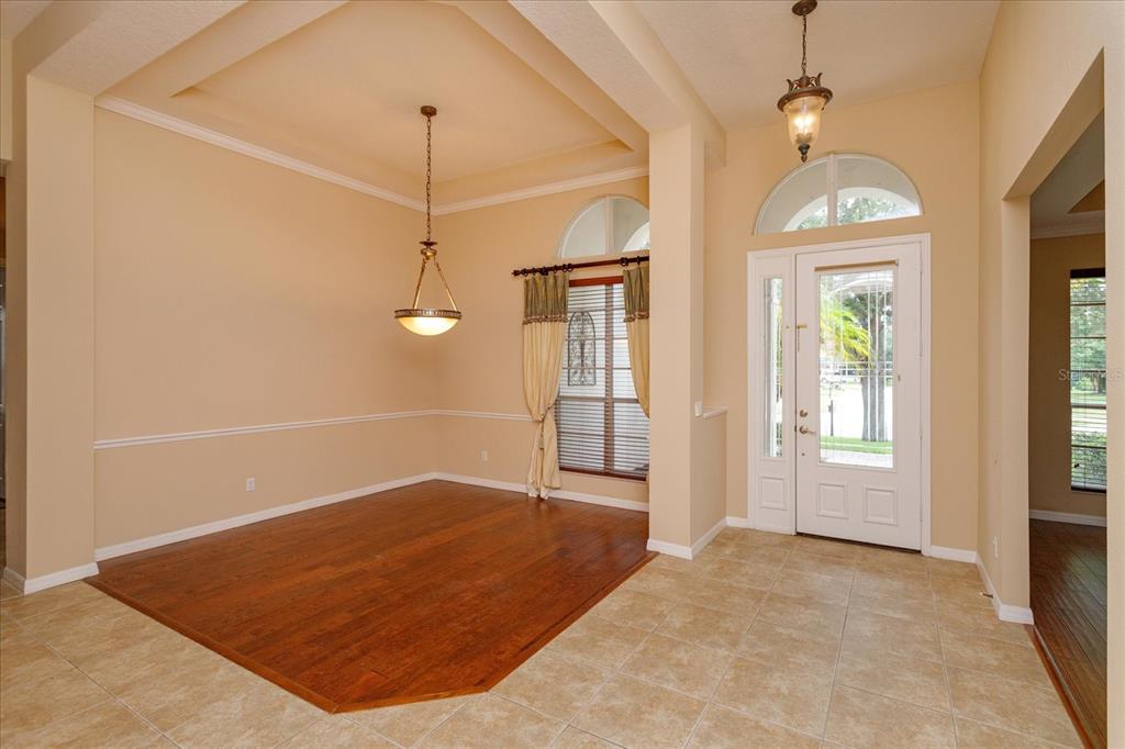 11445 Vicolo Loop Windermere, FL 34786 - Photo 3 of 28 a view of a room with windows and ceiling fan