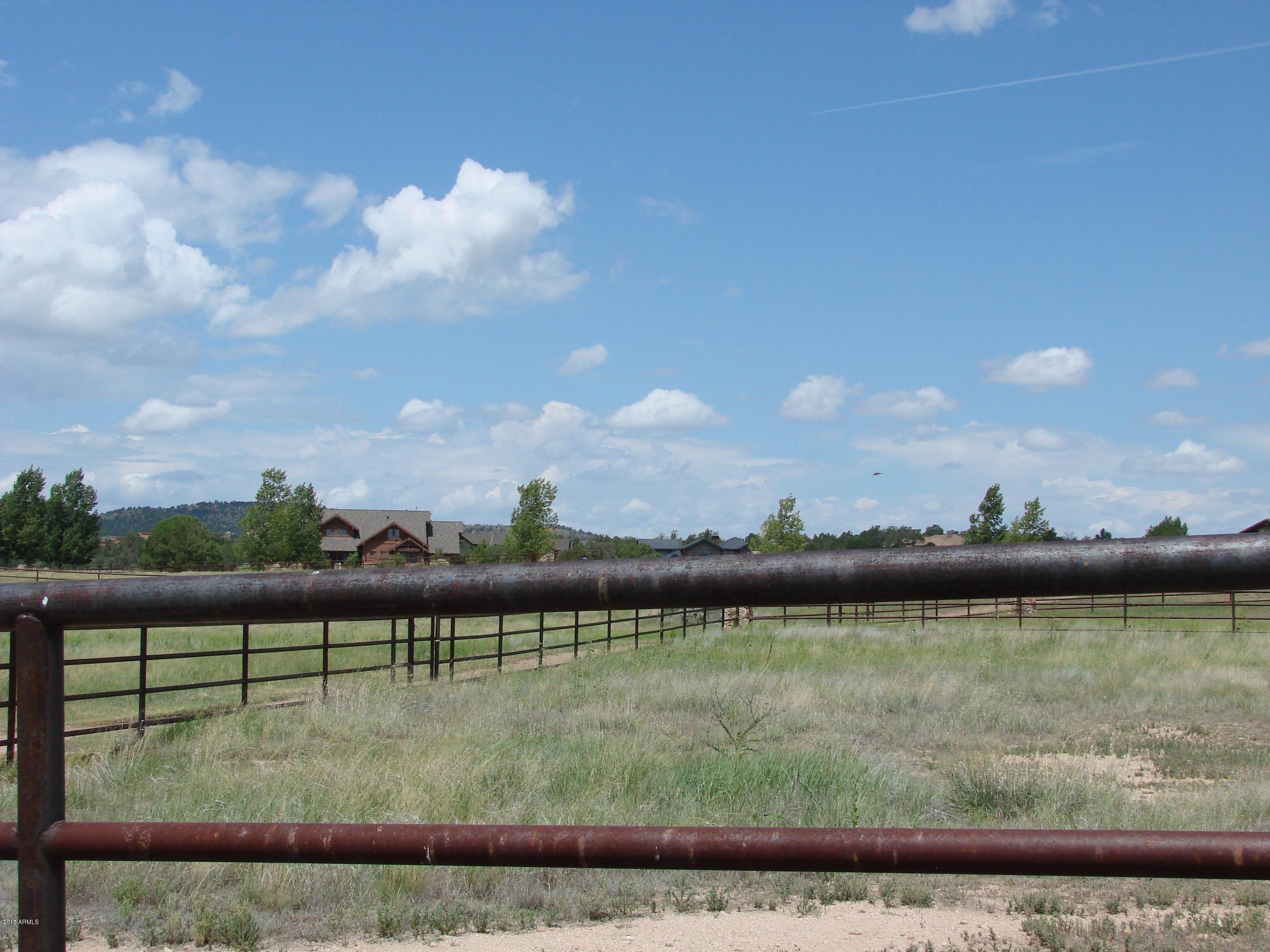 9310 North Callahan Road, Unit LOT 99 Prescott, AZ 86305 - Photo 4 of 25 Fully fenced with pipe and stone