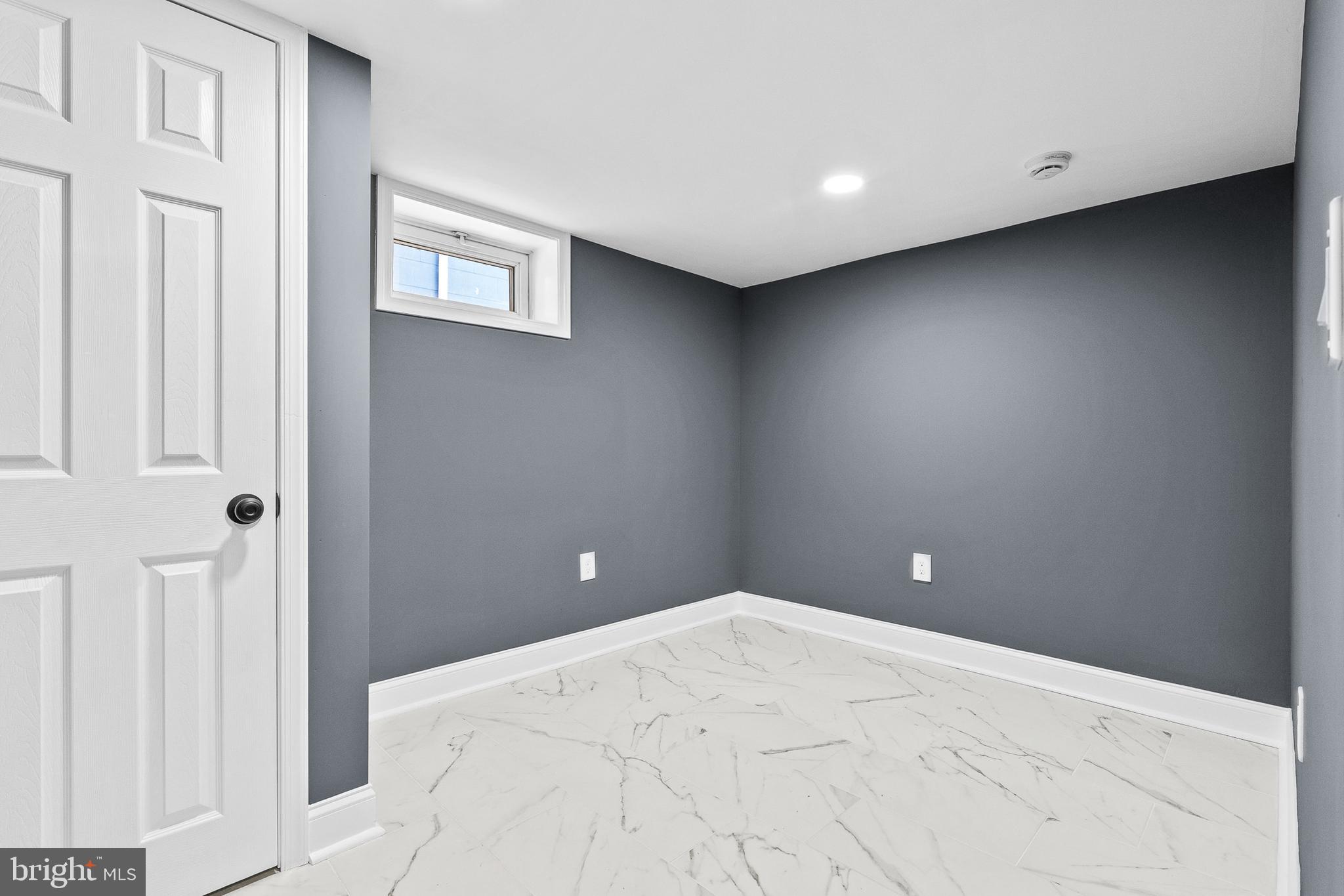210 Sollers Point Road Dundalk, MD 21222 - Photo 13 of 26 a view of a big room with closet and windows