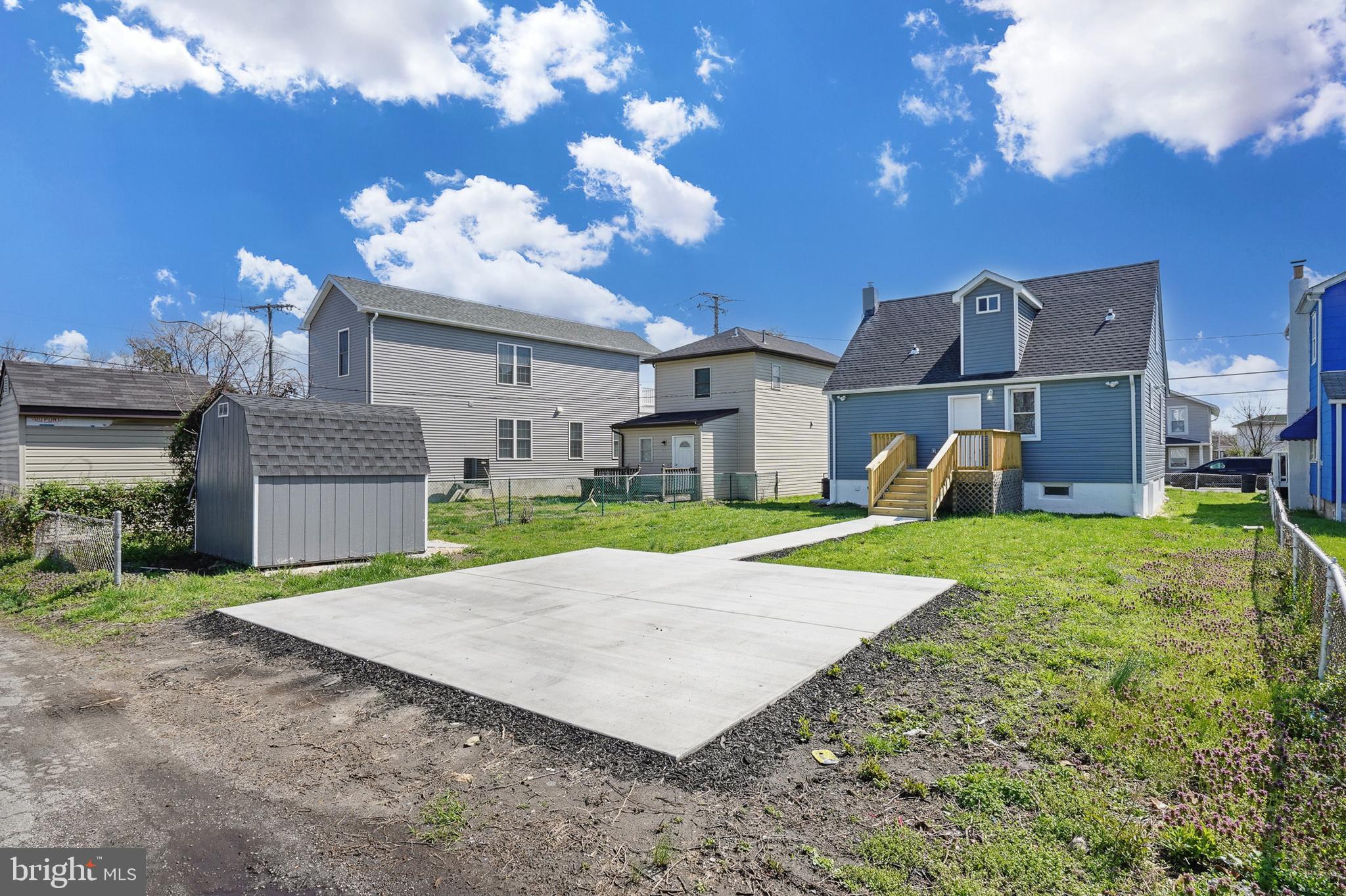210 Sollers Point Road Dundalk, MD 21222 - Photo 26 of 26 a view of a house with a backyard and a tree