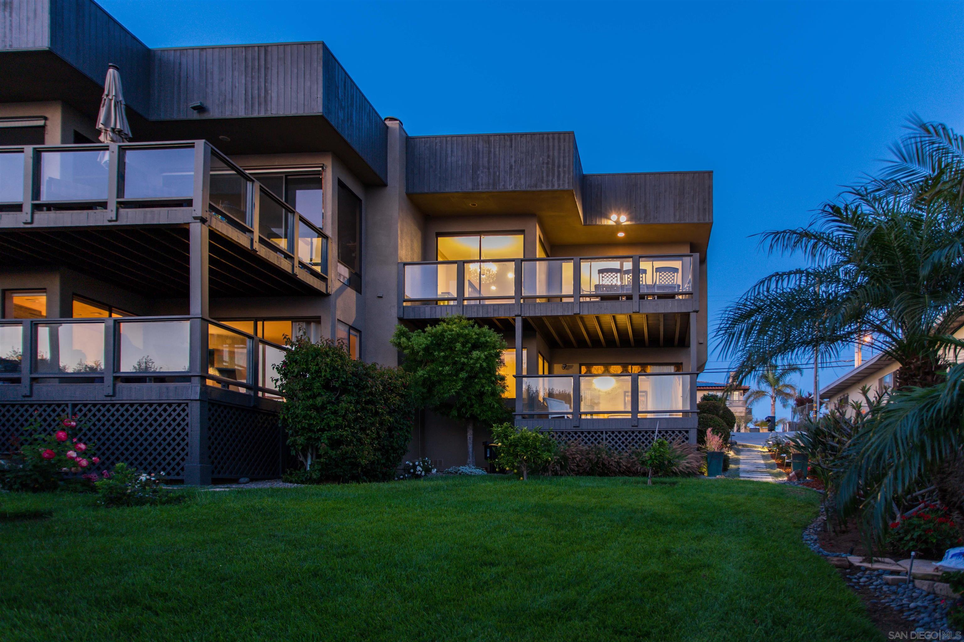 1528 Summit Avenue Encinitas, CA 92007 - Photo 20 of 21 a view of a house with a back yard