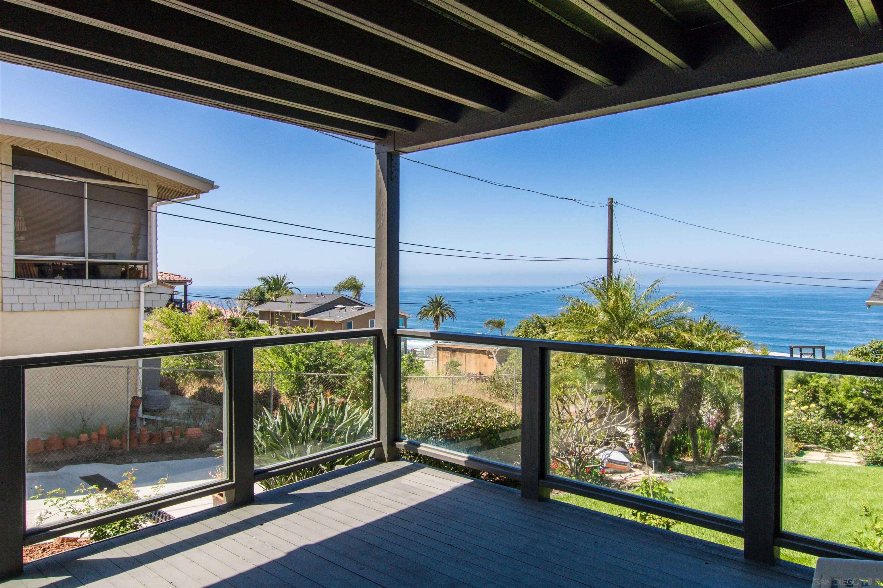 1528 Summit Avenue Encinitas, CA 92007 - Photo 3 of 21 a view of a porch with wooden floor