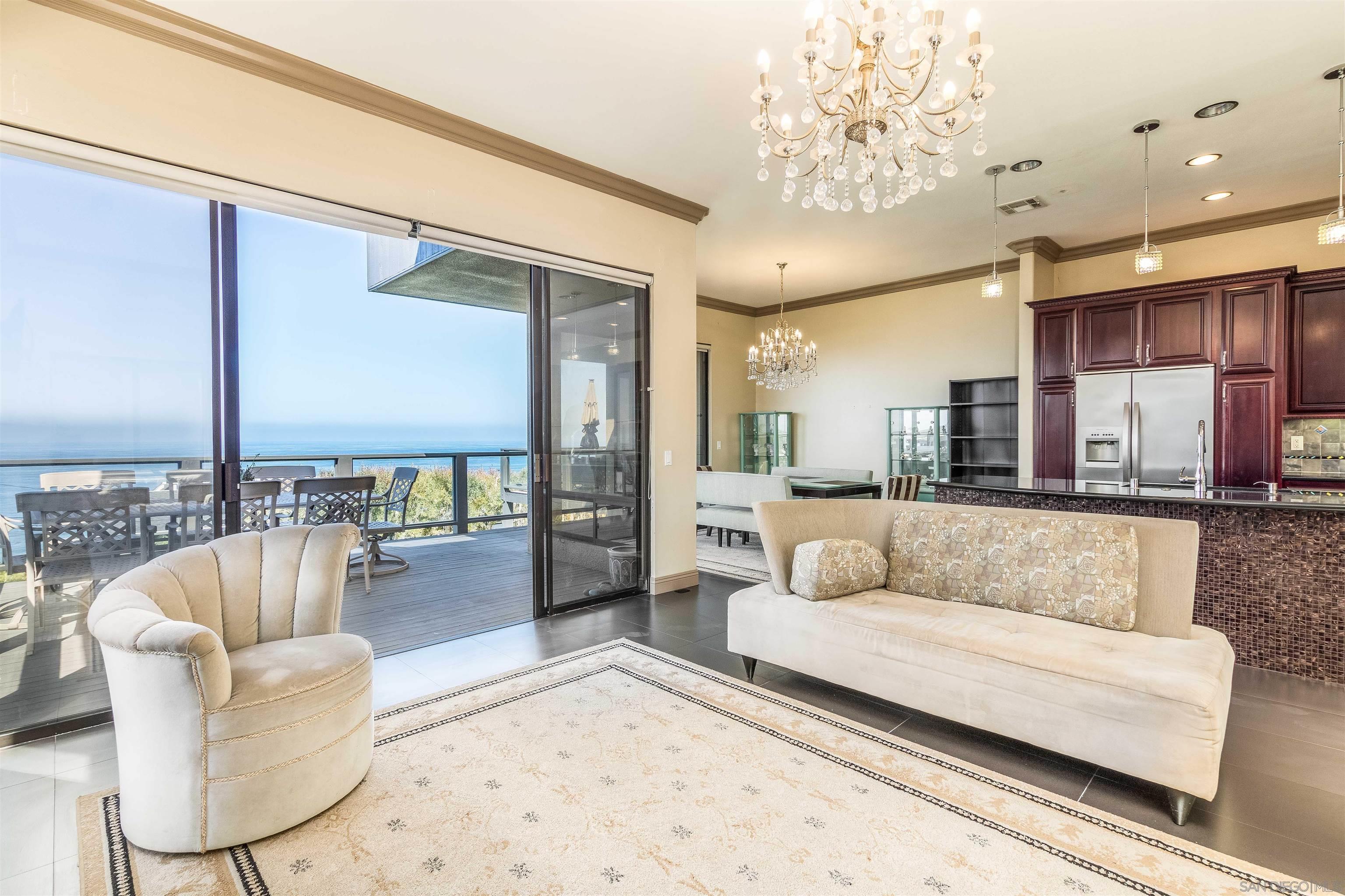 1528 Summit Avenue Encinitas, CA 92007 - Photo 6 of 21 a living room with furniture and a large window