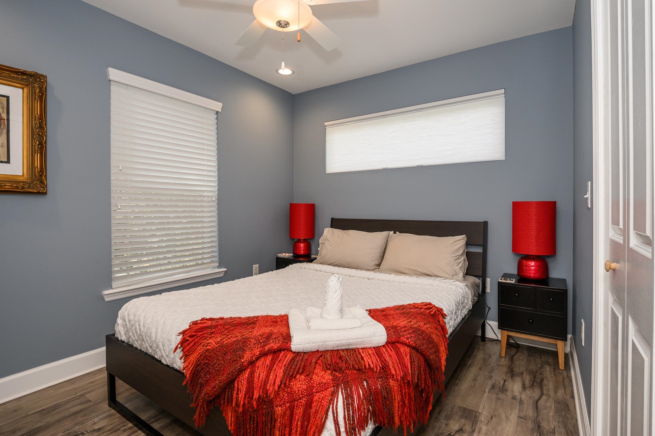 24 Saragossa Street St. Augustine, FL 32084 - Photo 91 of 99 a bed sitting in a bedroom next to a window