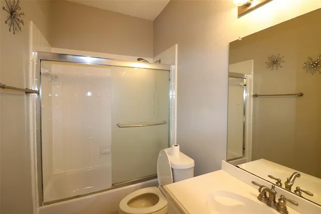 a bathroom with a sink and a shower