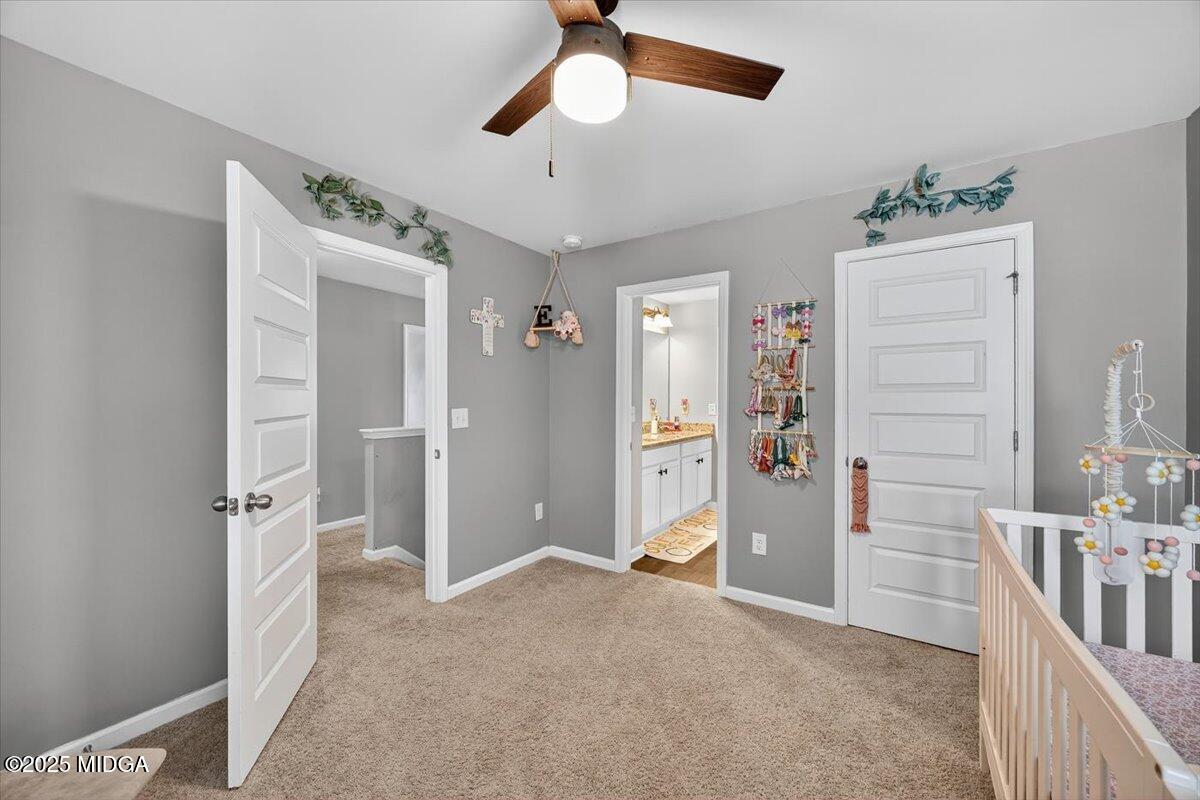 656 Dolly Drive Forsyth, GA 31029 - Photo 20 of 30 a view of empty room with closet and fan