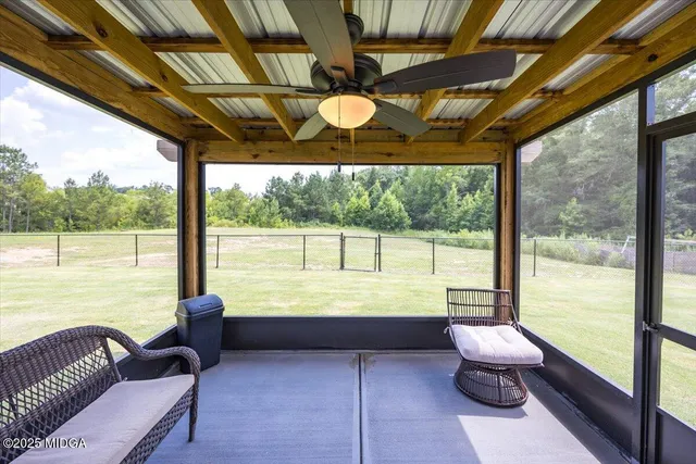a outdoor space with patio furniture and a potted plant