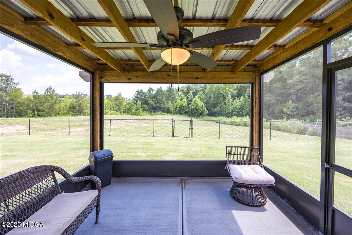 656 Dolly Drive Forsyth, GA 31029 - Photo 27 of 30 a outdoor space with patio furniture and a potted plant