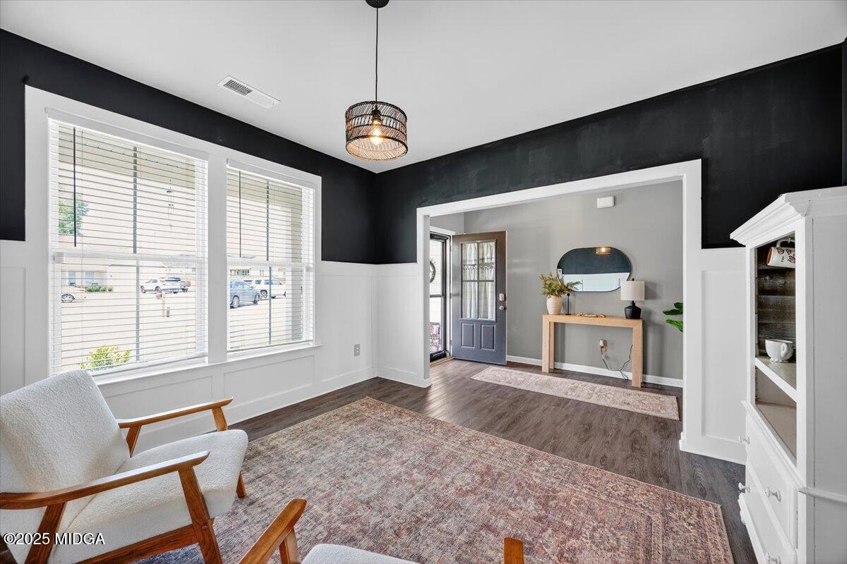 656 Dolly Drive Forsyth, GA 31029 - Photo 3 of 30 a living room with furniture and a flat screen tv