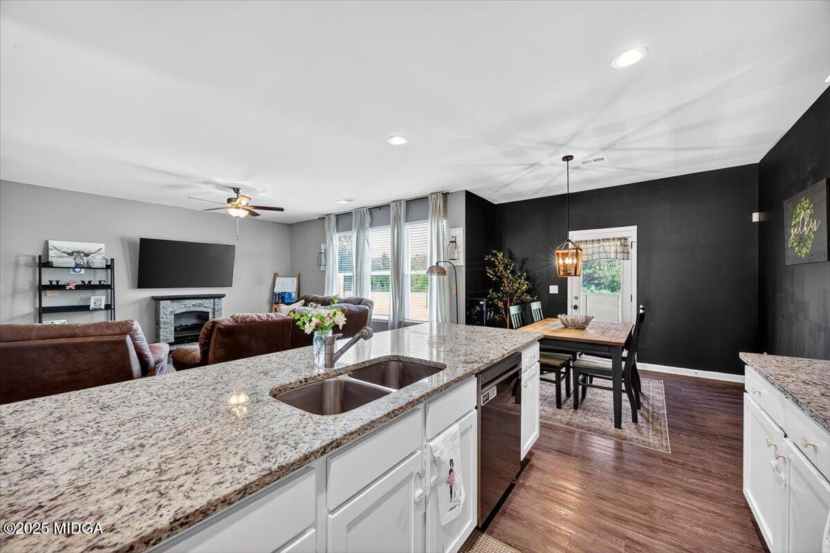 656 Dolly Drive Forsyth, GA 31029 - Photo 7 of 30 a kitchen with sink cabinets and counter space