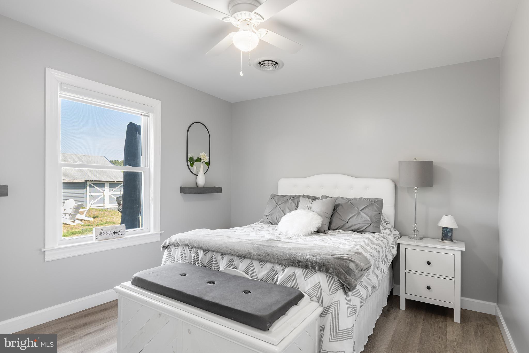25485 Hignutt Road Denton, MD 21629 - Photo 26 of 52 a bedroom with a bed and a window