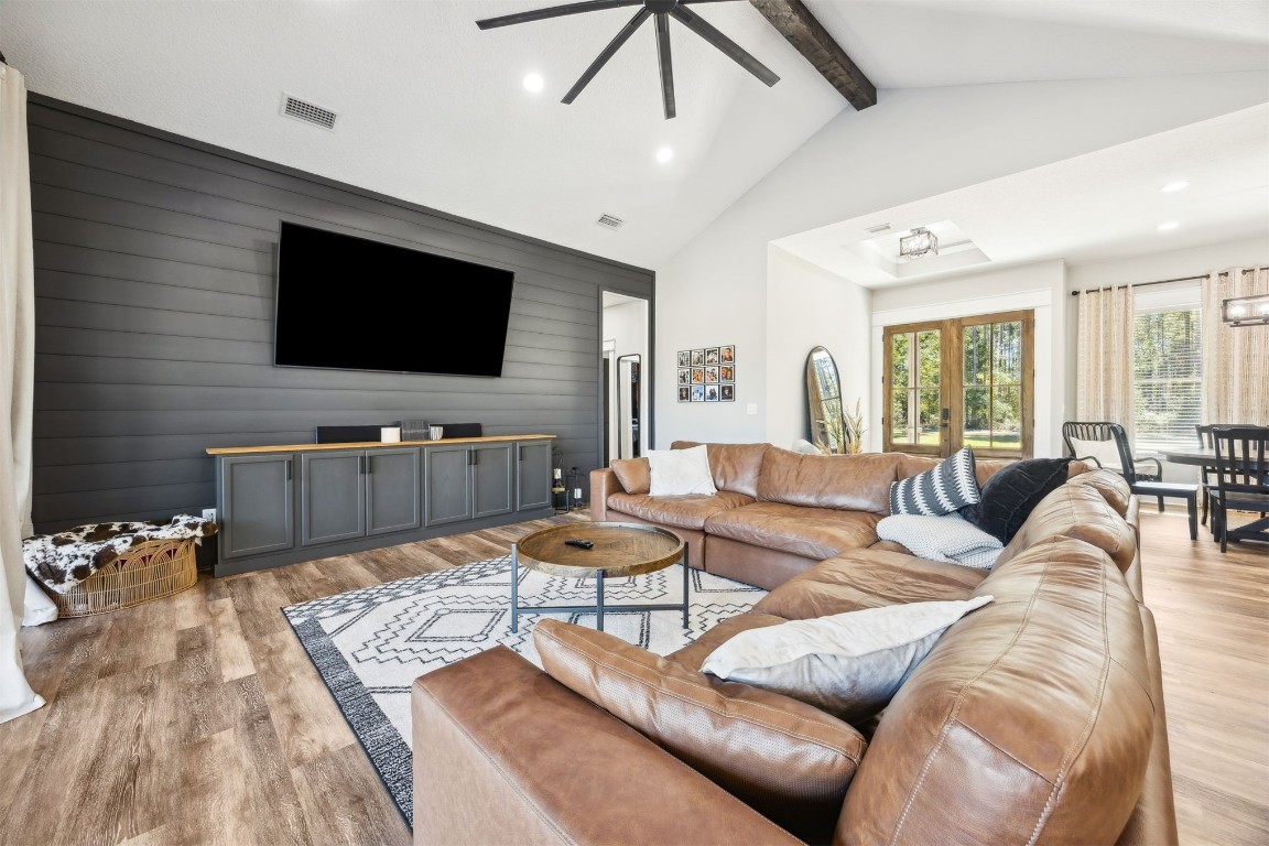 32500 Crossfire Trail Callahan, FL 32011 - Photo 14 of 64 a living room with furniture and a flat screen tv