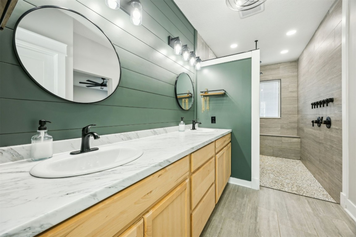 32500 Crossfire Trail Callahan, FL 32011 - Photo 28 of 64 a bathroom with a sink and a mirror