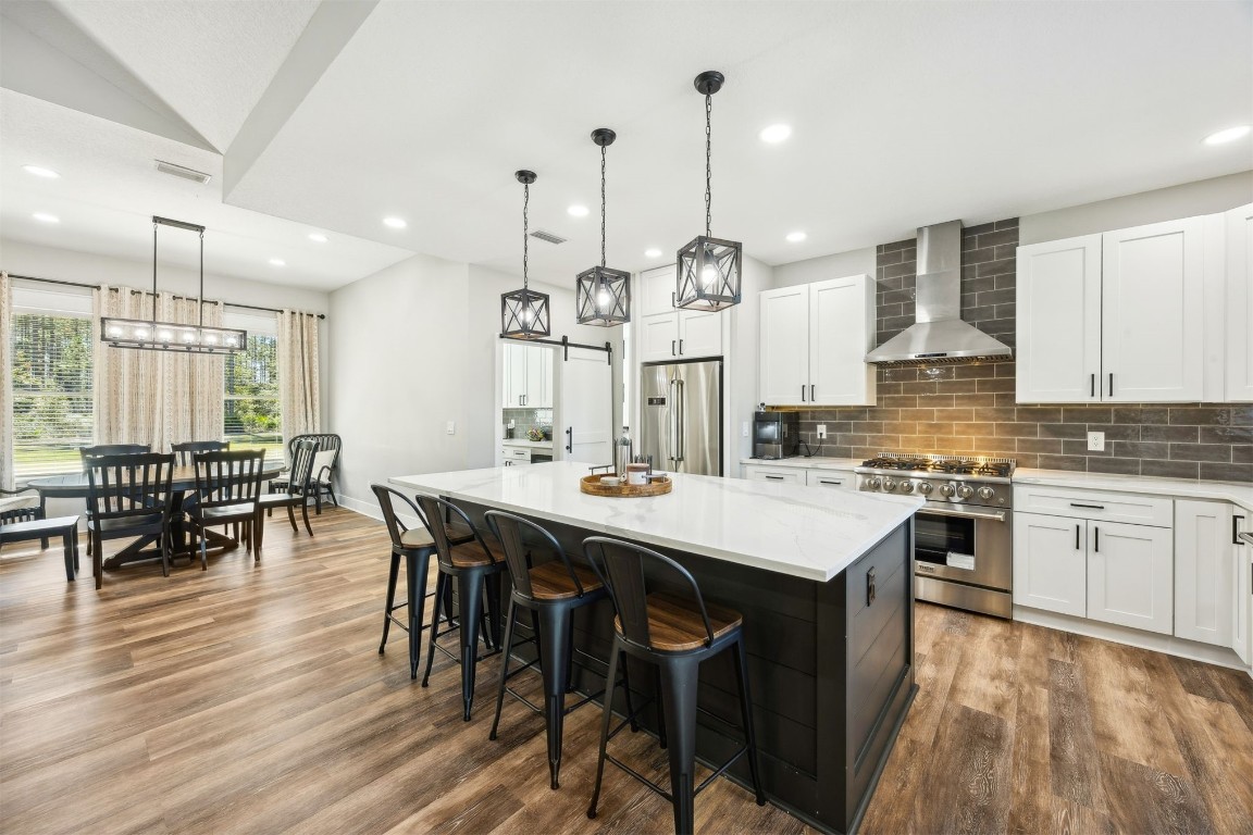 32500 Crossfire Trail Callahan, FL 32011 - Photo 4 of 64 a large kitchen with a table and chairs