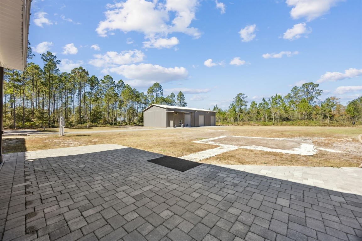 32500 Crossfire Trail Callahan, FL 32011 - Photo 52 of 64 a view of yard with swimming pool and green space