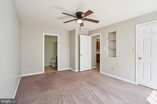 a view of room with ceiling fan
