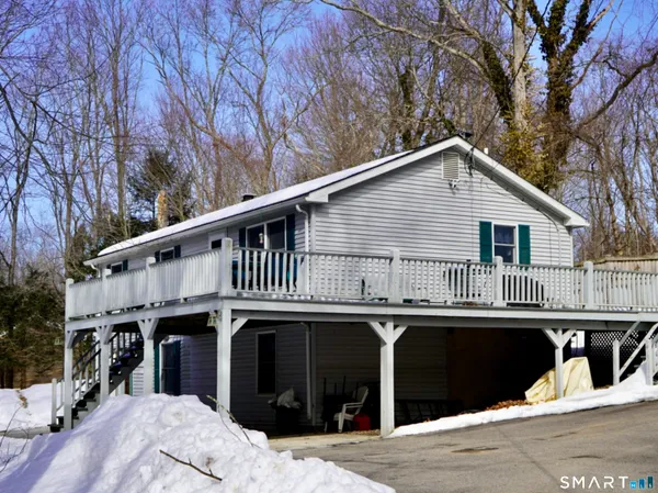 a view of a house with a roof deck