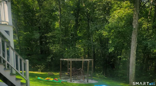 a view of a yard from a balcony