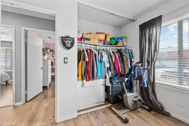 a view of a closet with storage