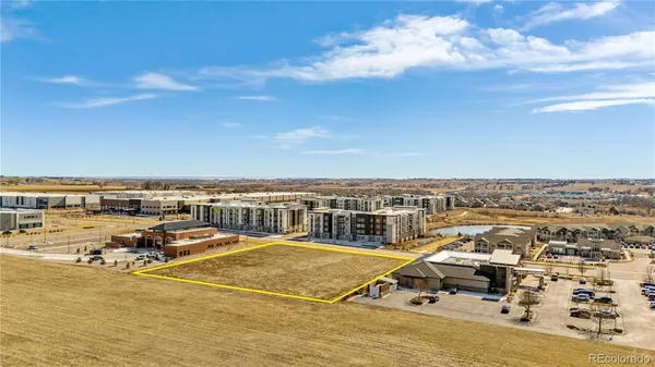 a big room with yard and wooden fence