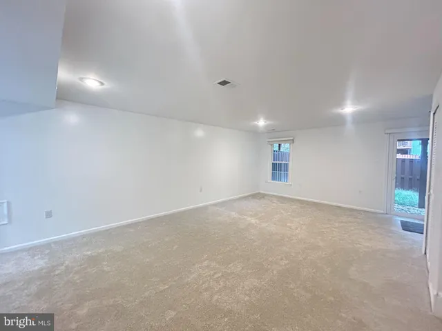 an empty room with an entryway